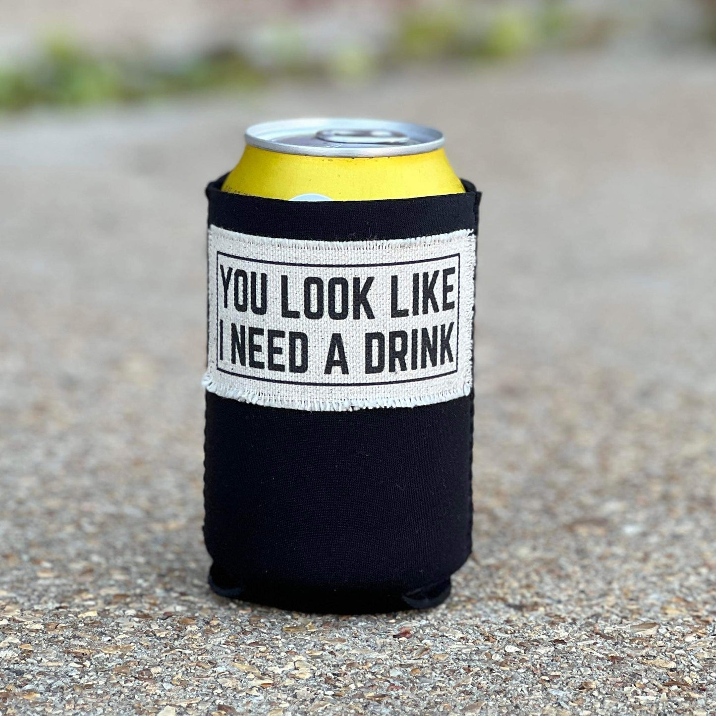 You Look Like I Need a Drink Black Regular Coozie