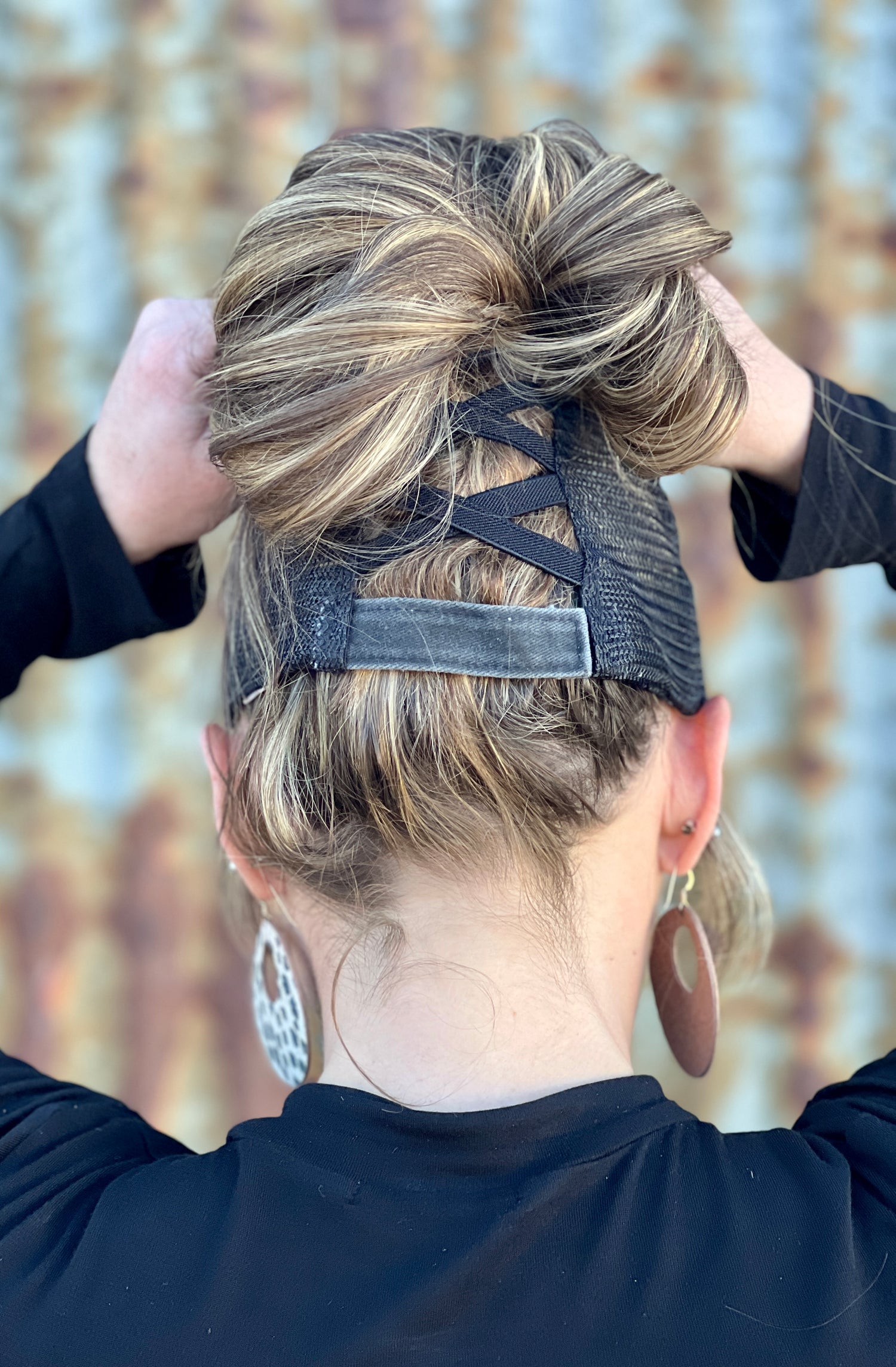 Back of distressed womens ponytail baseball cap 