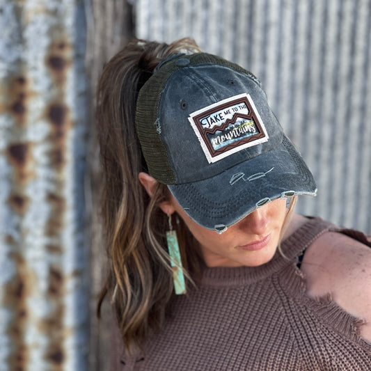Take me to the Mountains material patch with genuine leather frame. 