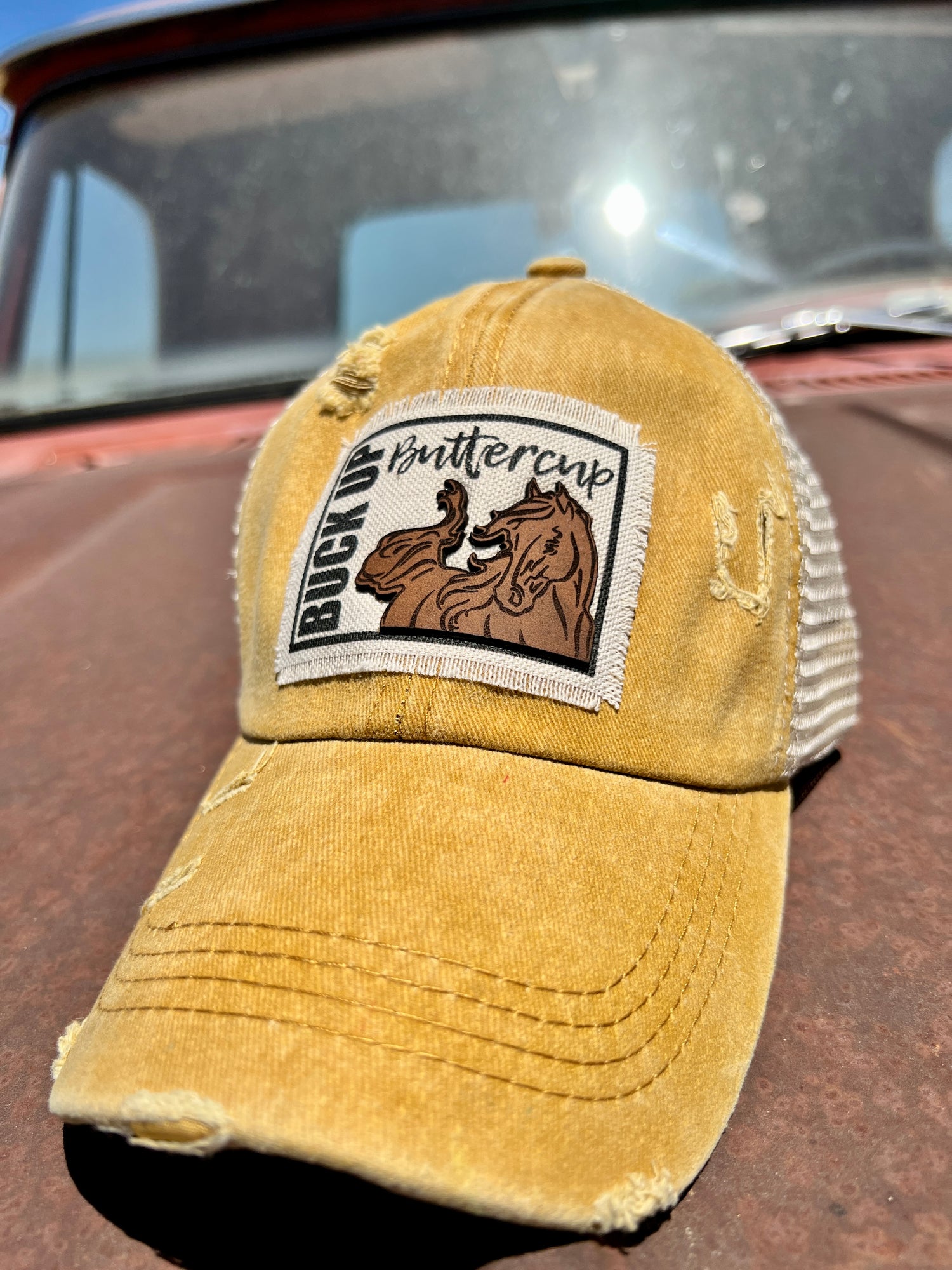 Distressed Mustard baseball cap with material and leather combined patch 