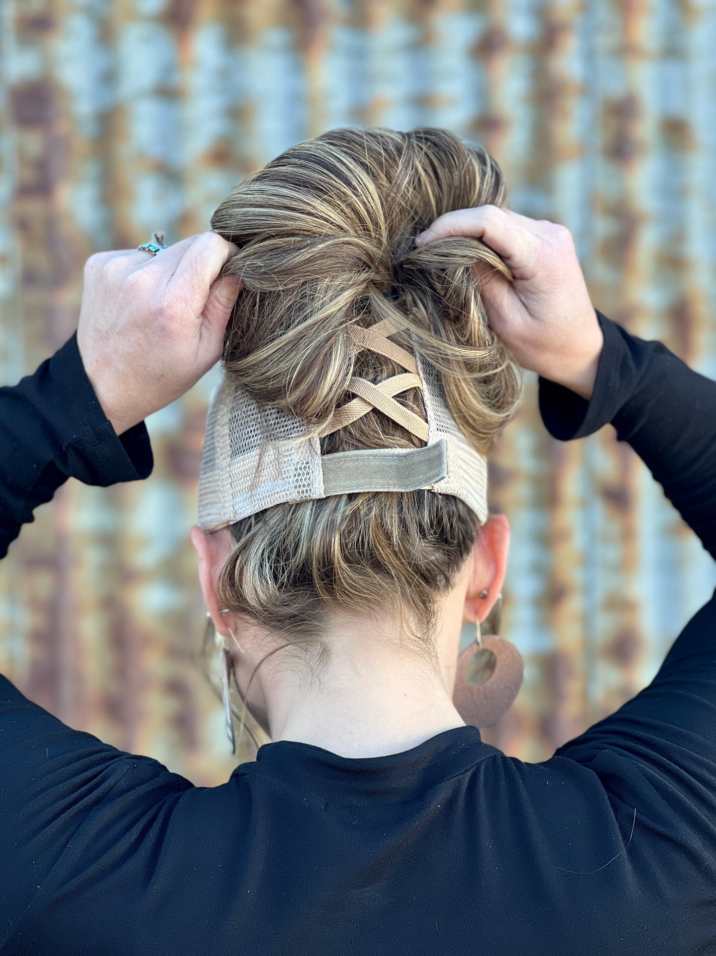 Back of womens ponytail back caps